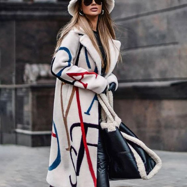 Emma: Oversize wool coat in cream with statement lettering