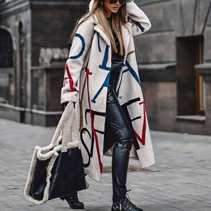 Emma: Oversize wool coat in cream with statement lettering
